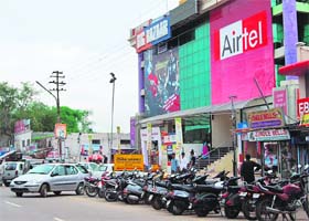 Vehicles parked in a prohibited zone in front of a shopping mall in Ambala