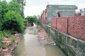 Encroachments along the Singhnullah choe in Zirakpur