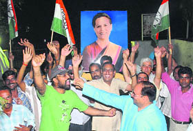 Congress workers celebrate UPA’s triumph at Congress Bhawan in Sector 35, Chandigarh, on Tuesday.