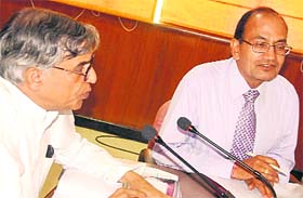 Pawan Bansal addresses bankers at the district review committee meeting of banks at UT Guest House in Chandigarh
