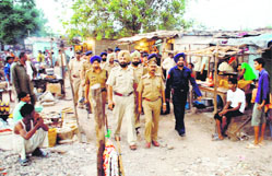 A Chandigarh police team during a special search drive at Nehru Colony, Sector 53, Chandigarh