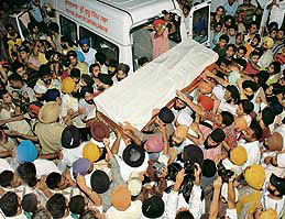 The body of Ishmeet Singh being taken to the Dayanand Medical College mortuary in Ludhiana on Wednesday night. The body reached Ludhiana from Delhi by a special chopper provided by the Punjab government. The cremation will take place on Thursday.