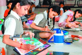 Schoolchildren during a drawing and colouring competition at Hare Krishna Dham, Sector 36-B, Chandigarh