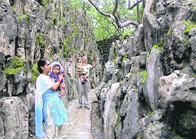 A family enjoys at the Rock Garden in Chandigarh on Friday.