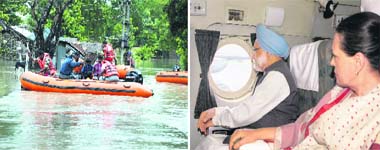 Army personnel rescue flood-affected villagers from submerged houses in Sitpur in Supaul district; and (right) Prime Minister Manmohan Singh and UPA chairperson Sonia Gandhi make an aerial survey of the flood-affected areas in Bihar