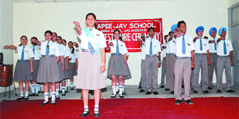 Prefects of Apeejay School, Rama Mandi, take oath at the investiture ceremony in Jalandhar on Thursday