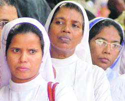 Christians protest against Orissas communal violence, in New Delhi on Friday. 