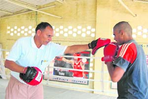 Jagdish Singh (L) has been conferred the Dronacharya Award for his contribution to the advancement of Indian boxing