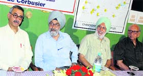 (from left) Manmohan Sareen, Justice S.S.Sodhi, S.S. Boparai and M.N. Sharma during a discussion on issues affecting the character and environment of Chandigarh at the Chandigarh Press Club