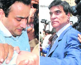 Sanjeev Nanda being taken to the lock-up from the Patiala House Courts in New Delhi on Tuesday. Suresh Nanda (right) looks shocked after the court pronounced his son guilty