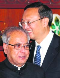 External Affairs Minister Pranab Mukherjee and his Chinese counterpart Yang Jiechi smile before their meeting in New Delhi