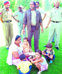 Ravi Kumar, a worker of the Municipal Corporation, Patiala, with his wife, two daughters and two sons in Patiala on Wednesday.
