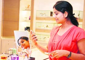 A girl buys a perfume at Montblanc boutique