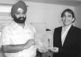 Dr Gutinderjit Singh is honoured by Dr Antony in Paris