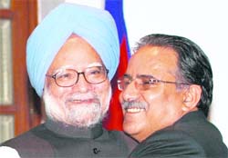 Nepal’s Prime Minister Pushpa Kamal Dahal, also known as ‘Prachanda’, hugs Prime Minister Manmohan Singh when they met in New Delhi on Monday.