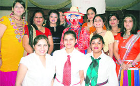Members of the Gayatri Ladies Club at a function in Ludhiana on Monday.