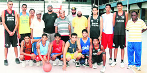 Members of the Punjab junior basketball team with office-bearers of the Punjab Basketball Association and coaches in Ludhiana on Monday.
