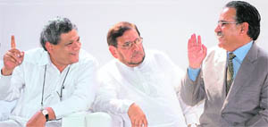 Nepal’s Prime Minister Prachanda (extreme right) with CPM leader Sitaram Yechury at a lunch hosted by JD (S) chief Sharad Yadav (centre) in New Delhi on Tuesday.
