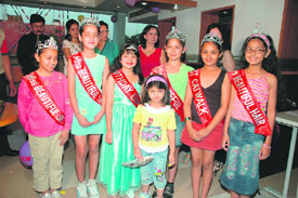 Girls parade on a makeshift ramp during a birthday party, and (right) the finalists get a tiara and a sash