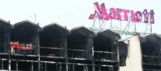 The burnt-out shell of Marriott Hotel on Monday.