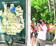 A foreign couple click the guidemap of the city at Government Museum and Art Gallery on Saturday.