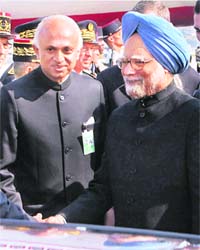 Prime Minister Manmohan Singh with Indian Ambassador to France Ranjan Mathai after his arrival at Marseille airport in France