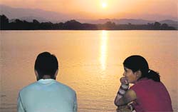 A newly-married couple enjoys the morning glory at Sukhna Lake in Chandigarh