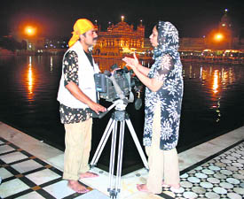 A Pakistan team shoots for documentary “Tryst with Trees” on the Golden Temple premises in Amritsar.