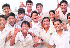Players of Modern School, Delhi, after winning the IPSC Cricket Tournament at YPS, Mohali, on Wednesday.