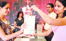 A hair salon in the city was among those saying no to plastic by handing out paper bags on Thursday.