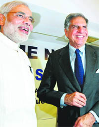 Chairman of Tata Motors Ratan Tata (R) with Gujarat CM Narendra Modi prior to the signing of the memorandum of understanding on the Nano project in Gandhinagar on Tuesday.