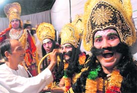 Brushing up history: Behind-the-scenes grooming for participants enacting the roles of Ravana and others at a Ramlila in Sector 15.