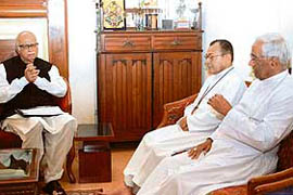 Leader of the Opposition L.K. Advani with Delhi Archbishop Vincent M. Concessao and a Christian priest during a meeting on violence in Orissa and Karnataka, in New Delhi on Wednesday.