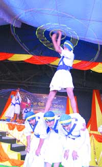 Students perform gatka during a function to mark the culmination of Maa Boli Mela in Amritsar