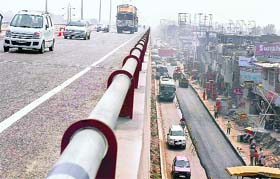 As traffic moves on one section of the Zirakpur flyover, re-carpeting is being done on the carriageway leading to Patiala
