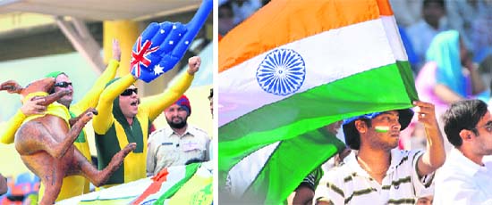 Australian supporters motivate their team members; and (right) Indian cricket lovers enjoy the 3rd day of India Vs Australia second Test match at PCA stadium, Mohali
