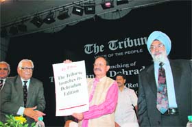 Uttarakhand Chief Minister B. C. Khanduri launches the Dehradun edition of The Tribune at Dehradun