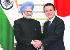 Prime Minister Manmohan Singh with Japanese Prime Minister Taro Aso at the latter's official residence in Tokyo on Wednesday.