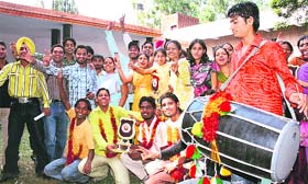 The students of SCD Government College, Jagraon, celebrate their victory in various events during the youth fest