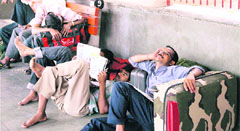 The long wait at the Delhi railway station on Thursday.
