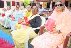 Inmates of the Old Age Home-15 hold on to their Divali hampers