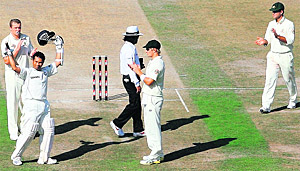 Sachin is applauded by Australian cricketers Peter Siddle (left), Shane Watson (centre) and captain Ricky Ponting (right) after becoming the leading run-scorer in Test match cricket history during the first day of the second Test match between India and Australia at PCA stadium in Mohali on October 17. Tendulkar crossed Brian Lara’s tally of 11,953 runs from 131 Tests