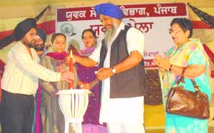Minister for sports and animal husbandry Gulzar Singh Ranike inaugurates a function during Yuvak Mela in Amritsar on Friday.