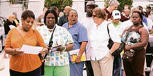 Voters line up to cast ballots as polls open in the U.S. general election in Deerfield Beach, Florida, on Tuesday.