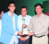 Harish Rai Dhanda honours Pranav Chopra in Ludhiana.