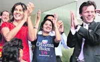US expatriate supporters of Barack Obama celebrate his win in Bangalore