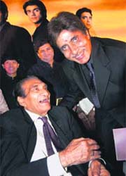 A file photo of Bollywood actor Amitabh Bachchan with veteran Bollywood filmmaker and producer B.R. Chopra, who brought big epics like the Mahabharata to the small screen