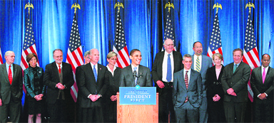 US President-elect Barack Obama speaks to the press on Saturday in Chicago. Obama met with the Transition Economic Advisory Board (rear) on the day the US labor department said 2,40,000 jobs had been cut in October, the 10th straight month of job losses, and new revisions meant that a whopping 6,51,000 workers have lost their livelihoods in the past three months alone.