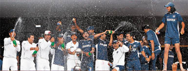 Indians celebrate after winning the Border-Gavaskar Trophy 2008, 2-0, against Australia in Nagpur on Monday.