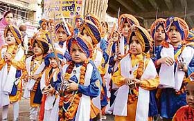 Small boys dressed as panj piaras during ‘nagar kirtan’ being taken out in Ludhiana